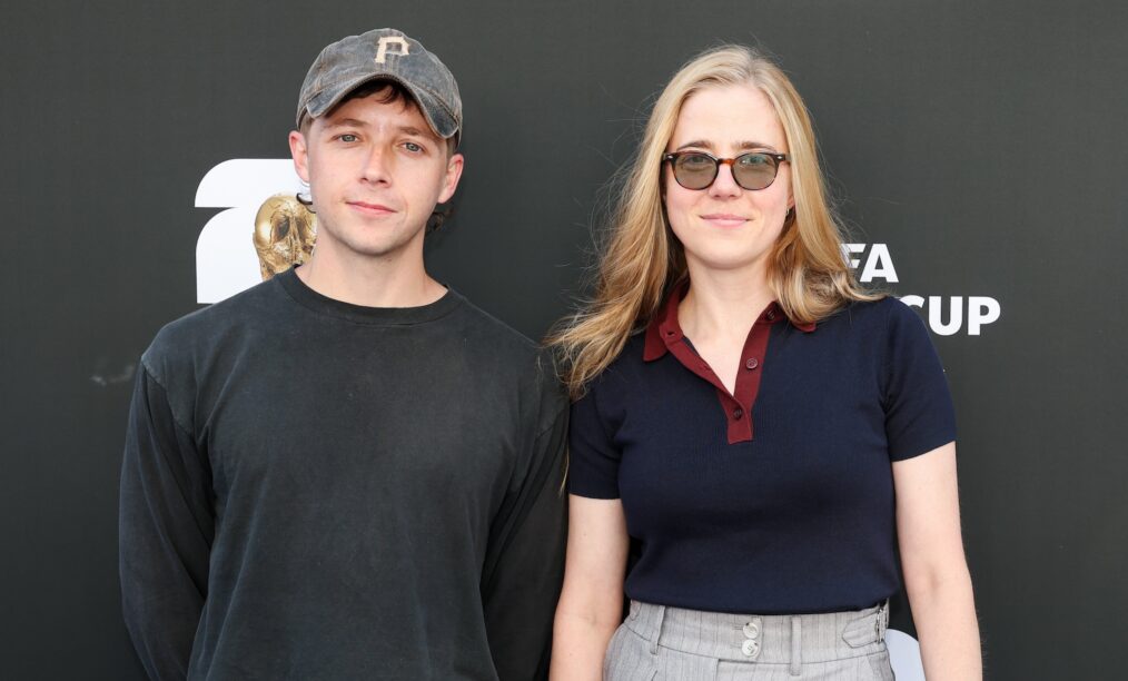 LOS ANGELES, CALIFORNIA - JUNE 12: (L-R) Gerran Howell and Taylor Dearden attend the FIFA World Cup 2026 Group D match between USA and Paraguay at Los Angeles Stadium on June 12, 2026 in Los Angeles, California. (Photo by Kevin Mazur/Getty Images)
