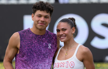 Ben Shelton of United States of America and his girlfriend Trinity Rodman of United States of America celebrates with trophy after winning final match against Taylor Fritz of United States of America during day seven of the BOSS Open 2026 on June 14, 2026 in Stuttgart, Germany
