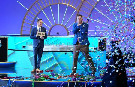 Ryan Seacrest and a "Wheel of Fortune" contestant on Season 43