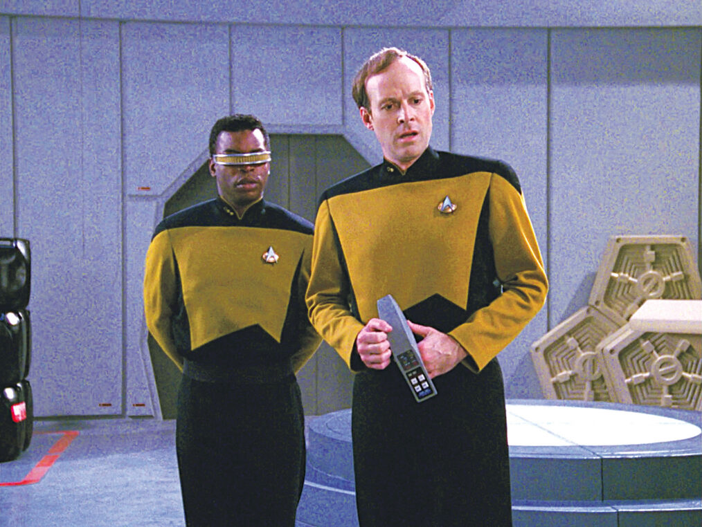 LOS ANGELES - APRIL 28: LeVar Burton as Lt. Commander Geordi La Forge and Dwight Schultz as Lt. Reg Barkley in the STAR TREK: THE NEXT GENERATION episode, "Hollow Pursuits." Original air date, April 28, 1990. Season 3, episode 21. Image is a screen grab.