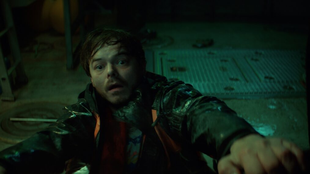Charlie Heaton as Wade Penney in a tense underwater scene from Below