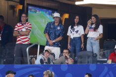 Brad Pitt, center, and Colin Farrell, sitting, watch the United States play Turkiye during a FIFA World Cup 2026 match at Los Angeles Stadium on June 25, 2026 in Inglewood, California.