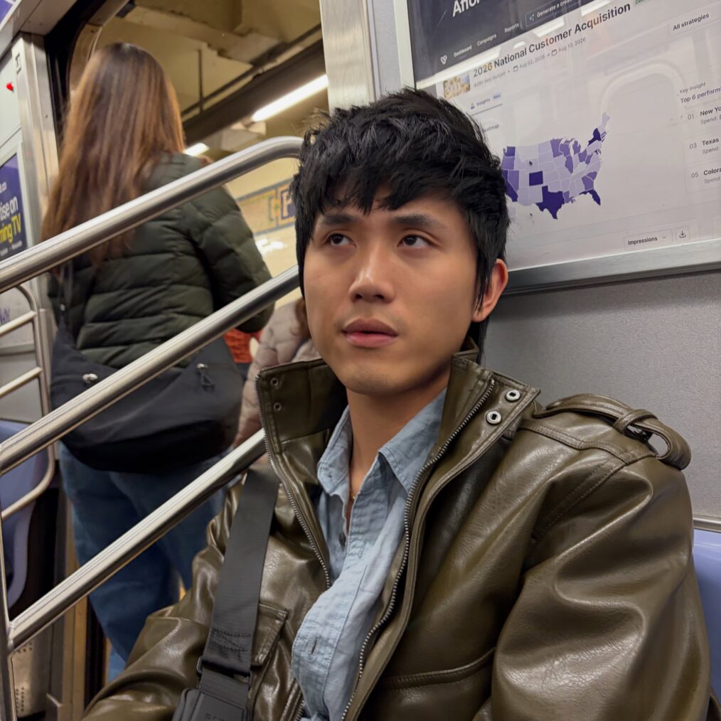 Charles Hsu on a New York subway train.