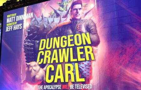 SAN DIEGO, CALIFORNIA - JULY 25: Key art is seen as Audible brings hit audio series “Dungeon Crawler Carl,” “Heads Will Roll” and “Bobiverse” to San Diego Comic-Con 2026 with creator panels and fan activation on July 25, 2026 in San Diego, California. (Photo by Phillip Faraone/Getty Images for Audible)