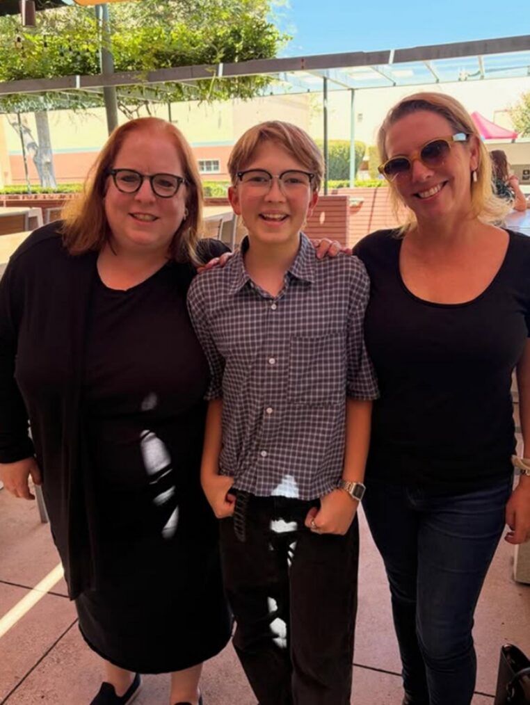 Nora Zuckerman, Matthew Lamb, and Lilla Zuckerman behind the scenes of 'High Potential' Season 3