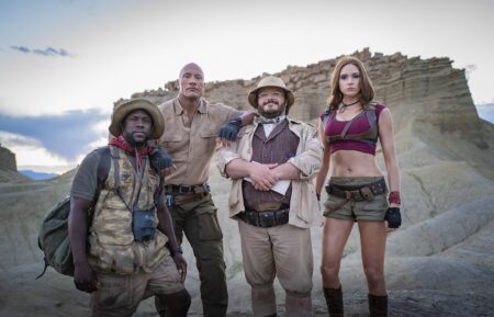 From left to right, Kevin Hart, Dwayne Johnson, Jack Black, and Karen Gillan stand in-costume in 'Jumanji: The Next Level'