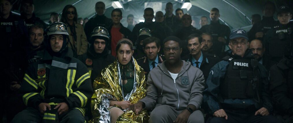 Sacrifice. (L-R) Ambika Mod as Katie and Sam Richardson as Oliver in Sacrifice. Cr. Courtesy of Netflix © 2026