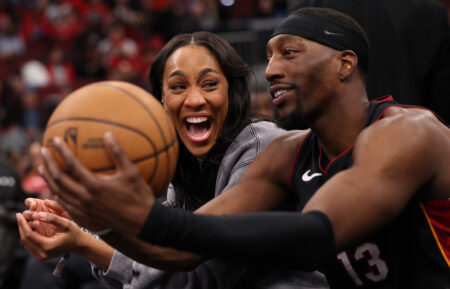 A'ja Wilson #22 of the Las Vegas Aces looks on with Bam Adebayo #13 of the Miami Heat before a game against the Chicago Bulls at the United Center on January 8, 2026