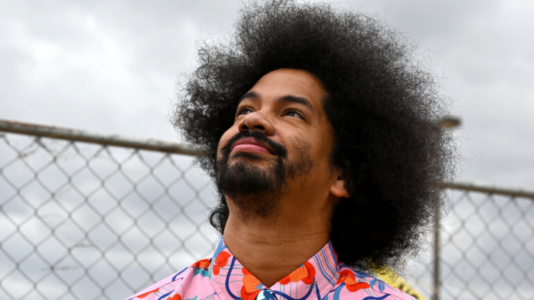Mychal Threets, a.k.a. Mychal the Librarian, attends the Read Them Home vigil against the child detention policies of ICE and the Trump Administration
