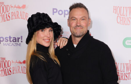 Brian Austin Green and Sharna Burgess at The 2025 Hollywood Christmas Parade on November 30, 2025 in Los Angeles, California