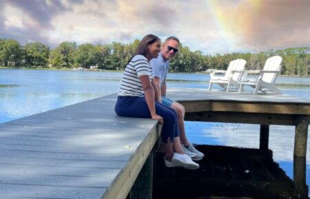 Brian and Mika Kleinschmidt sitting on a dock in a September 27, 2026 post