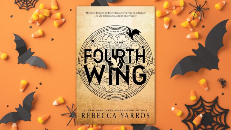 'Fourth Wing' novel on Halloween background