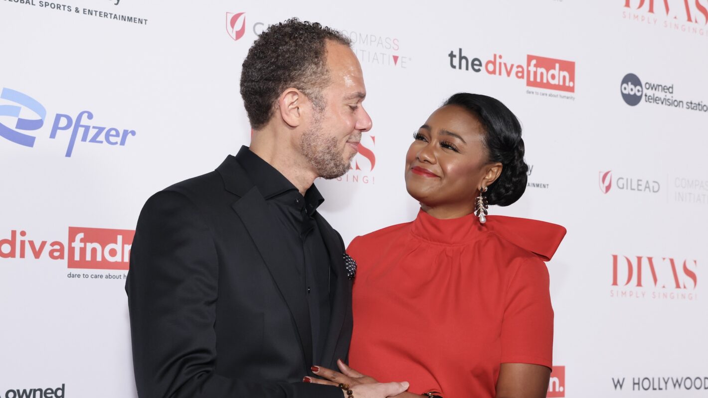 Tatyana Ali and husband Vaughn Rasberry
