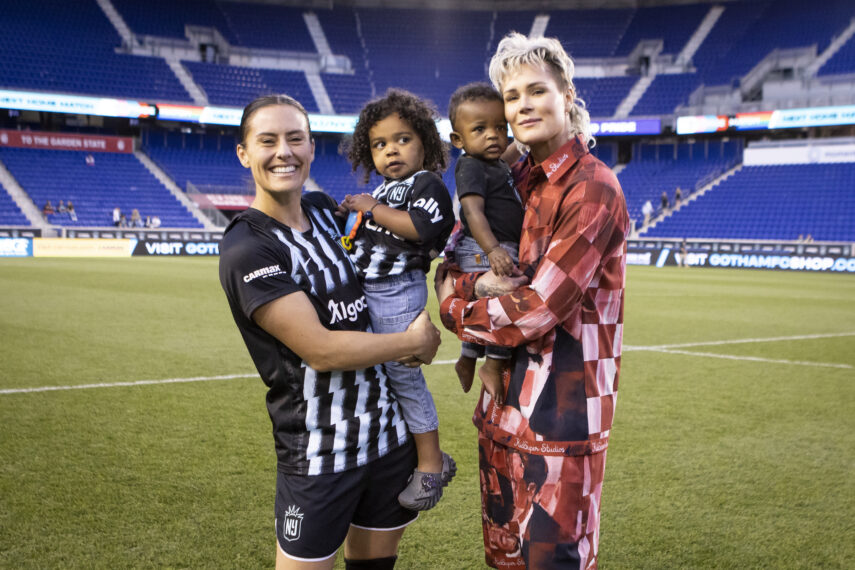 Ali Krieger #11 of NJ/NY Gotham FC and Ashlyn Harris, former NJ/NY Gotham FC player hold their children after the Mothers Day National Women's Soccer League match