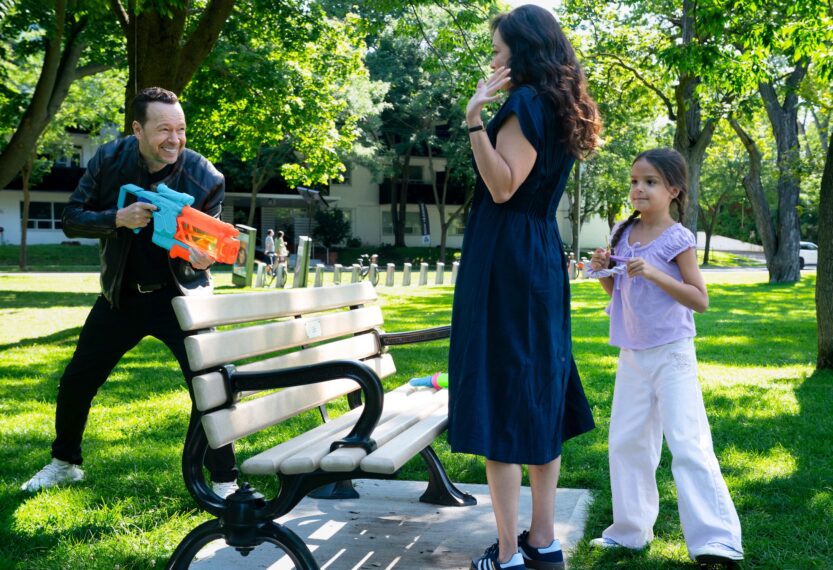 Donnie Wahlberg as Danny Reagan, Marisa Ramirez as Maria Baez, and Eleanor and Penelope Yataco as Elena Baez in 'Boston Blue' Season 2 Episode 2