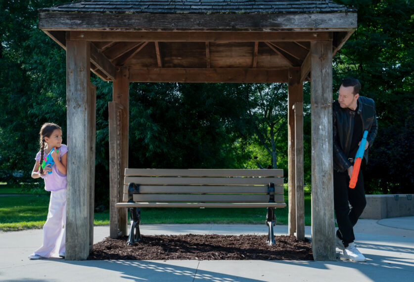 Donnie Wahlberg as Danny Reagan and Eleanor and Penelope Yataco as Elena Baez in 'Boston Blue' Season 2