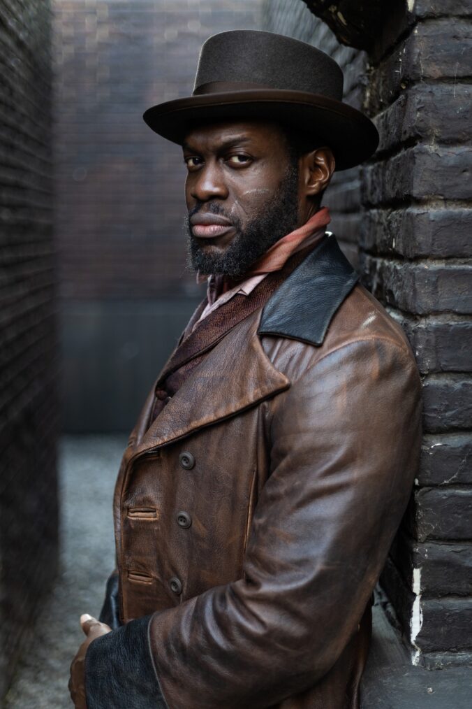 Moses (Ansu Kabia) in 'Miss Scarlet' Season 7