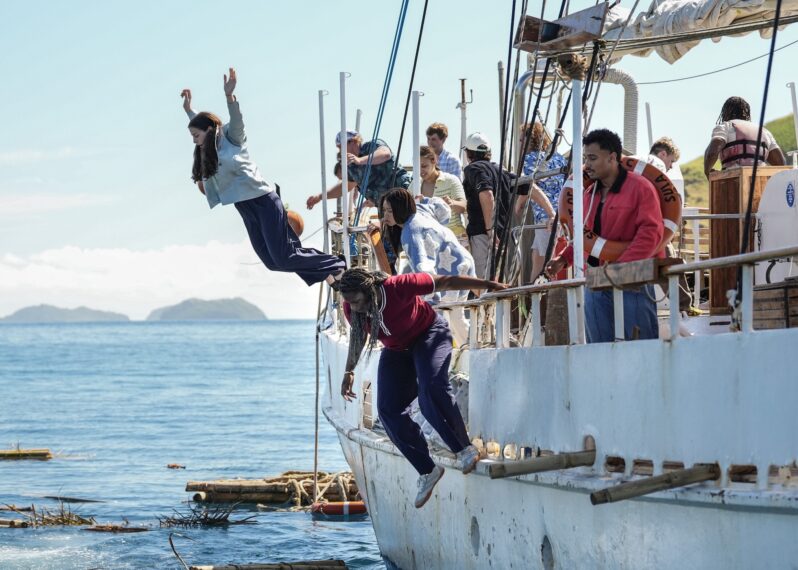 Alexis Levine and Sharonda Cox jump off a boat in the 'Survivor 51' premiere marooning challenge