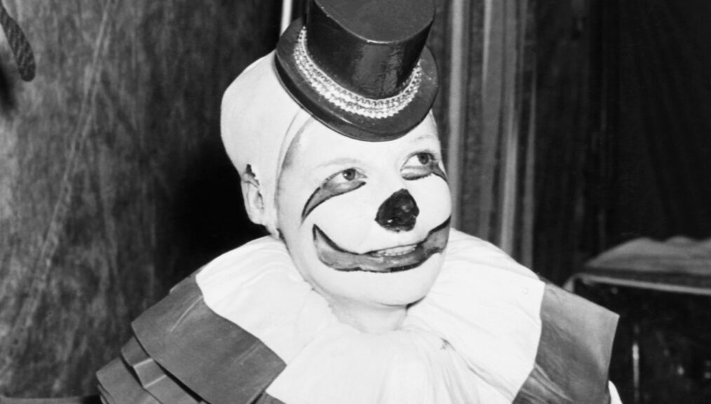 Ann Sheridan (right) fulfilling a liflong ambition to be a clown is seen here with Ringling Brothers, Barnum and Bailey Circus employee Helen Wolthing, 1946