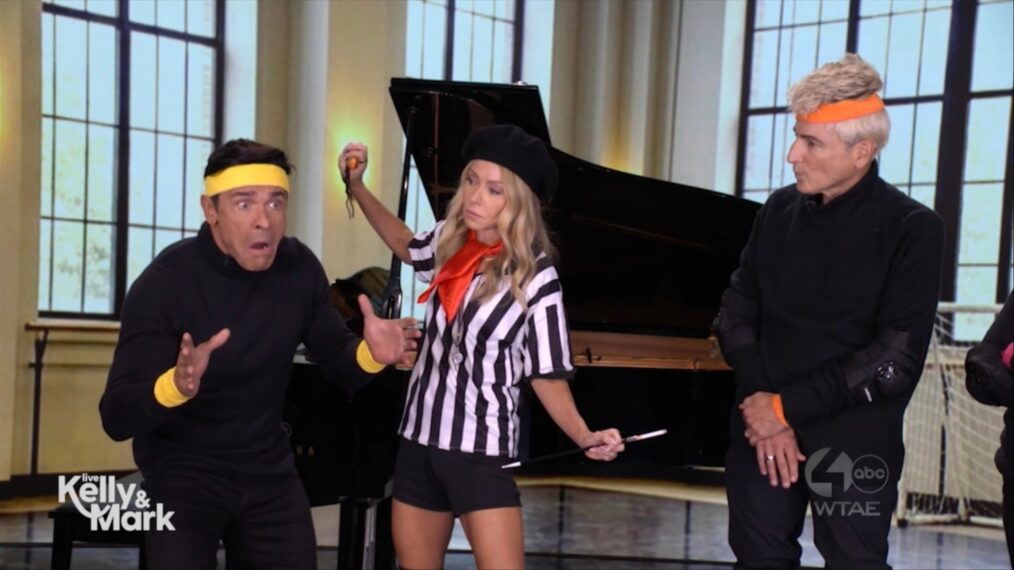 Mark Consuelos, Kelly Ripa, and Michael Gelman, 'Live With Kelly and Mark' Halloween 2026 episode tease, shown on October 26, 2026.