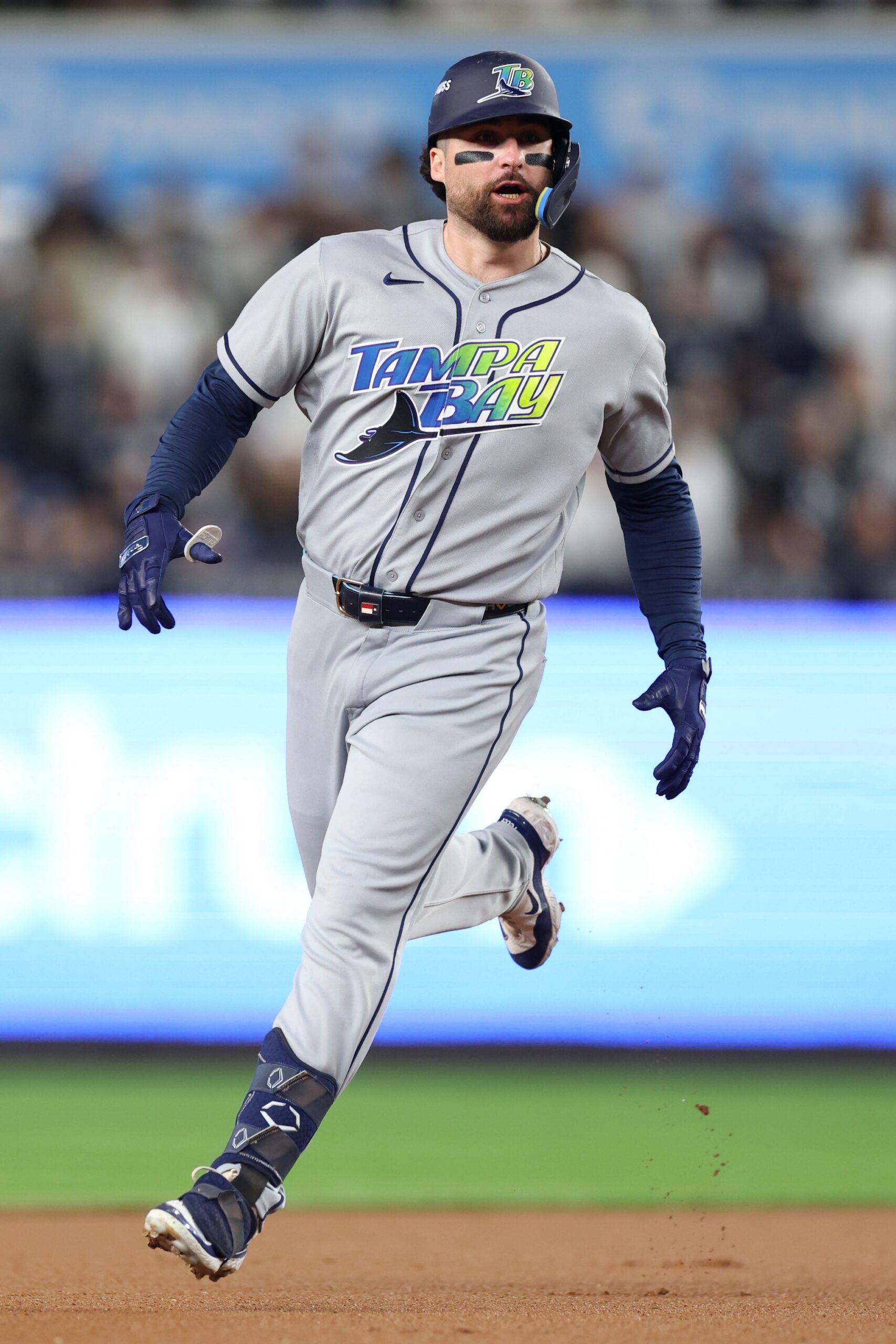 Ryan Vilade #26 of the Tampa Bay Rays runs around the bases after hitting a solo home run against the New York Yankees during the fourth inning in game three of the American League Division Series at Yankee Stadium on October 07, 2026 in the Bronx borough of New York City.