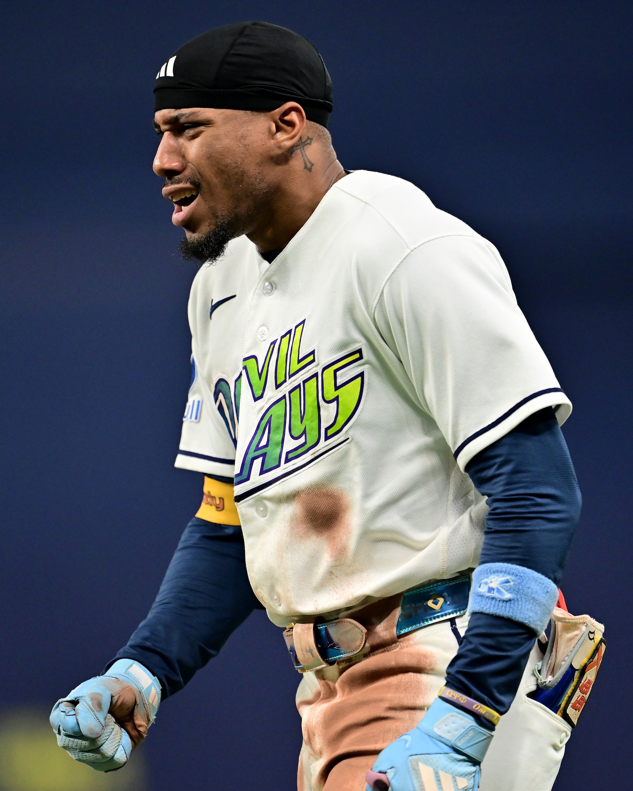 Chandler Simpson #14 of the Tampa Bay Rays reacts after bunting for a single during the third inning against the Cleveland Guardians in game six of the American League Championship Series at Tropicana Field on October 19, 2026 in St Petersburg, Florida.