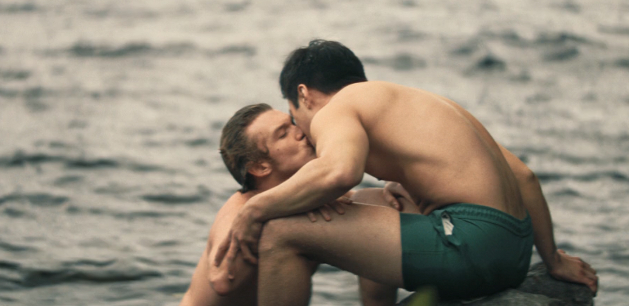 Ilya kissing Shane in the lake at the cottage in 'Heated Rivalry' Season 1 Episode 6