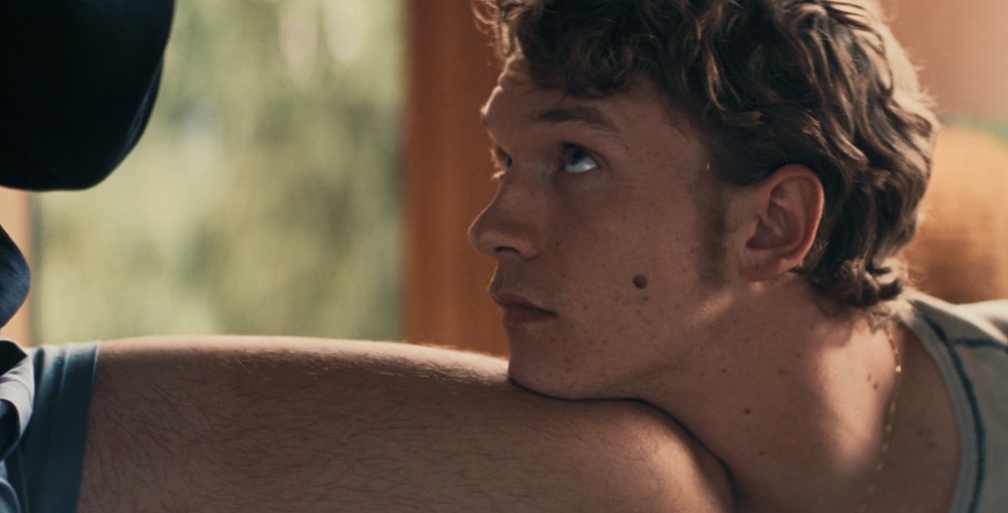 Ilya rests his head on Shane's knee in 'Heated Rivalry' Season 1 Episode 6