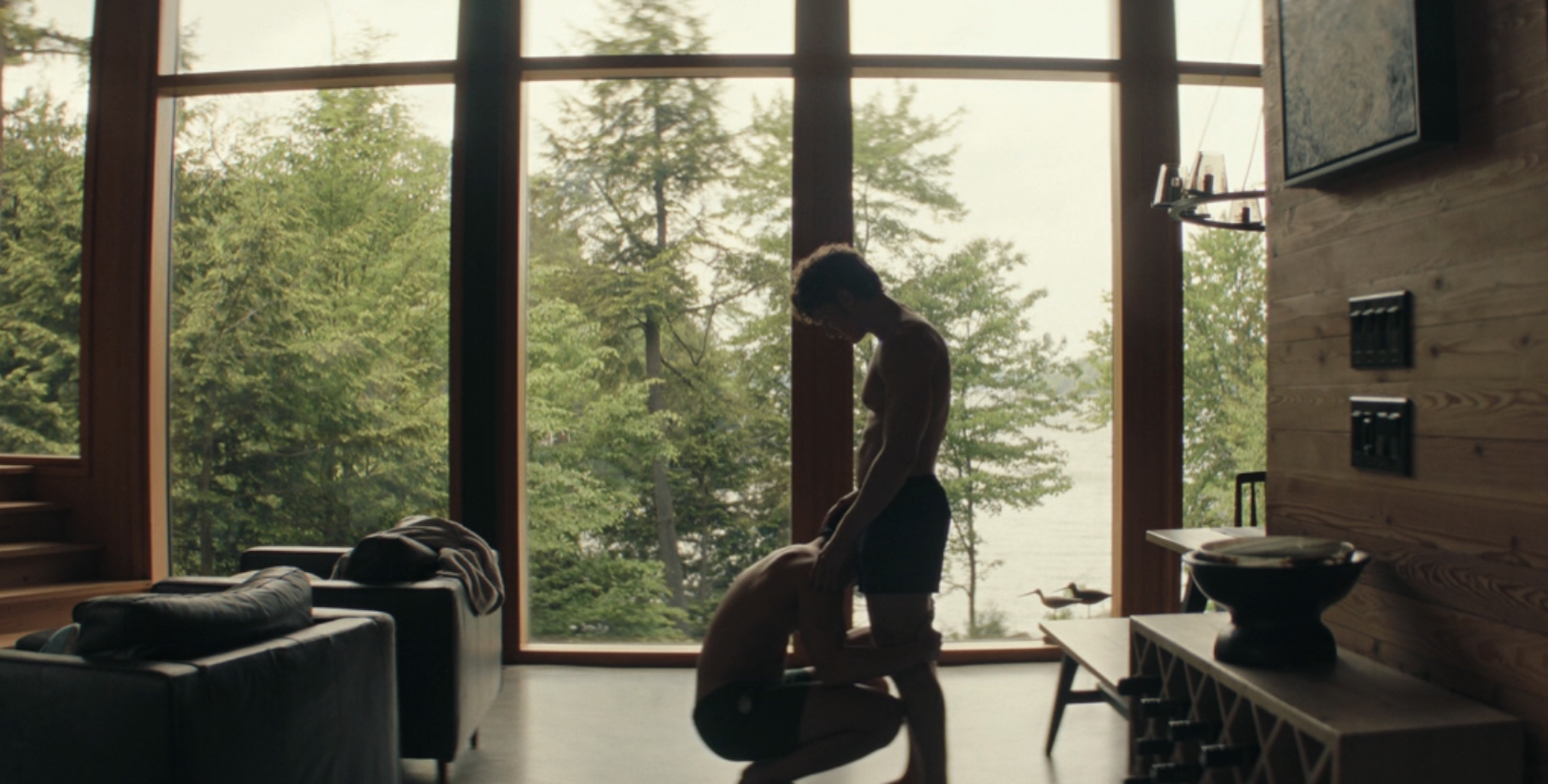 Ilya comforts Shane after Shane's dad sees them at the cottage in 'Heated Rivalry' Season 1 Episode 6