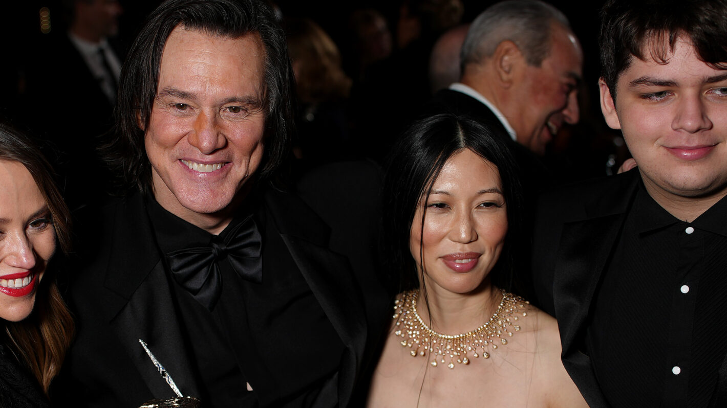 Jim Carrey, Min Ah and Jackson Riley pose during the 51st Cesar Film Awards at L'Olympia on February 26, 2026 in Paris, France