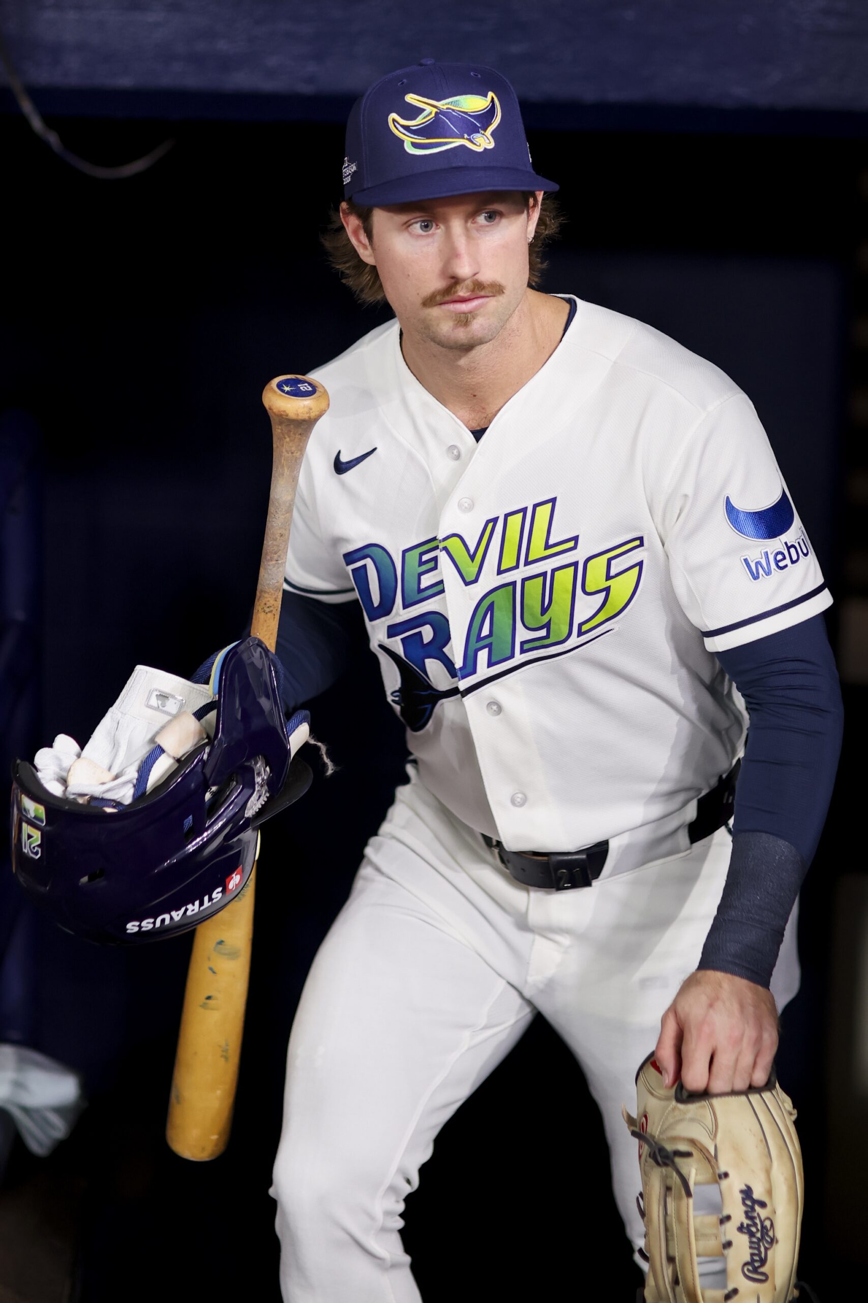 Jonny DeLuca #21 of the Tampa Bay Rays looks on from the dugout prior to during Game Two of the American League Championship Series between the Cleveland Guardians and the Tampa Bay Rays at Tropicana Field on Tuesday, October 13, 2026 in St. Petersburg, Florida.