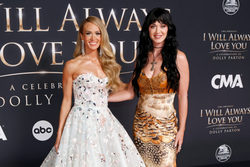 Carrie Underwood and Katy Perry attend "CMA Presents I Will Always Love You: A Celebration of Dolly Parton" at The Fisher Center for the Performing Arts on October 21, 2026 in Nashville, Tennessee