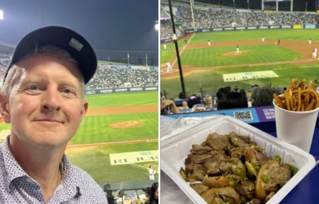 Ken Jennings at a baseball game in South Korea while eating pig's feet