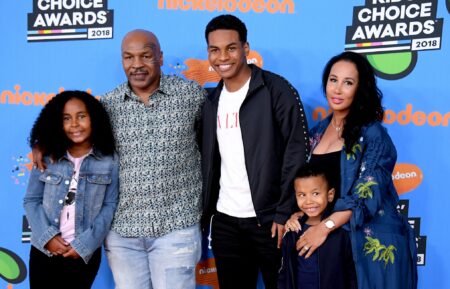 Mike Tyson (2nd L) with Lakiha Tyson (R) and Milan Tyson, Miguel Tyson, and Morocco Tyson attend Nickelodeon's 2018 Kids' Choice Awards at The Forum on March 24, 2018 in Inglewood, California.
