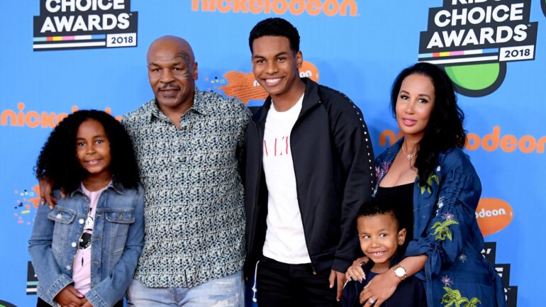 Mike Tyson (2nd L) with Lakiha Tyson (R) and Milan Tyson, Miguel Tyson, and Morocco Tyson attend Nickelodeon's 2018 Kids' Choice Awards at The Forum on March 24, 2018 in Inglewood, California.