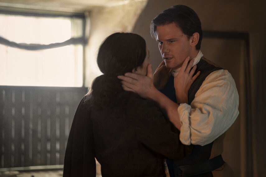 Hermione Corfield and Jeremy Irvine in 'Outlander: Blood of My Blood' Season 2