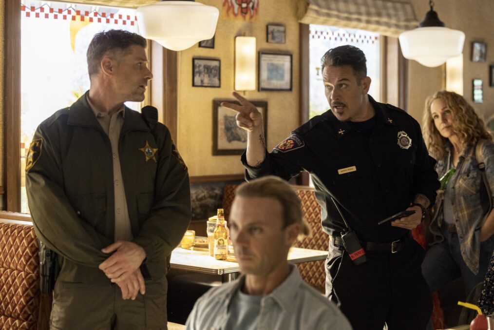 Matt Lauria as Boone and Kevin Alejandro as Manny Perez — 'Sheriff Country' & 'Fire Country' Crossover "No Way In"