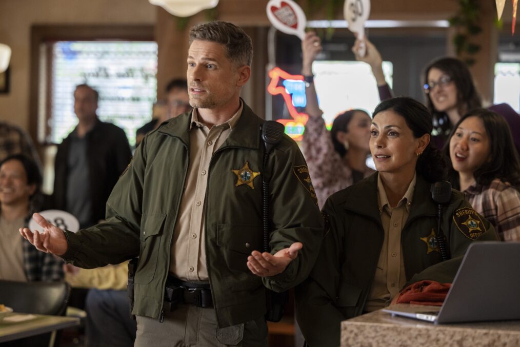 Matt Lauria as Boone and Morena Baccarin as Sheriff Mickey Fox — 'Sheriff Country' & 'Fire Country' Crossover "No Way In"