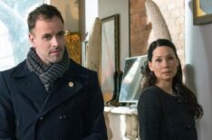 Jonny Lee Miller and Lucy Liu in Elementary