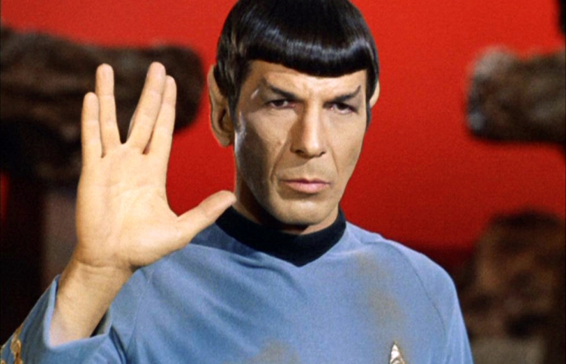 Leonard Nimoy as Spock giving the Vulcan hand sign